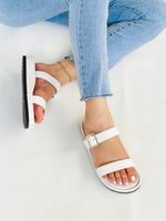Kara Slides White